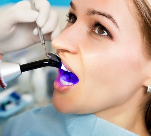Woman receiving dental bonding