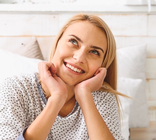 Woman with perfect smile after smile makeover
