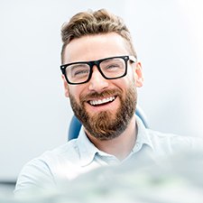 Smiling man in dentist�s chair