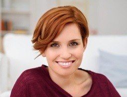 Woman with beautiful smile after cosmetic dentistry