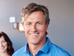 Man sharing smile after replacing missing teeth