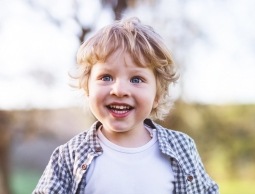 Child with healthy smile after children's dentistry