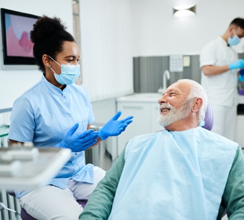 Man smiling in dental chair