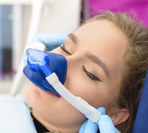 Patient with nitrous oxide nose mask